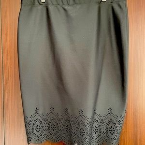 Beautiful pencil skirt. Black. XL. Elastic waist. Like new. Knee length.